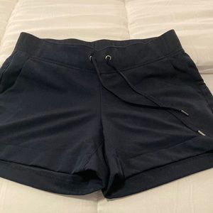 Like new never worn Navy Athleta super soft shorts